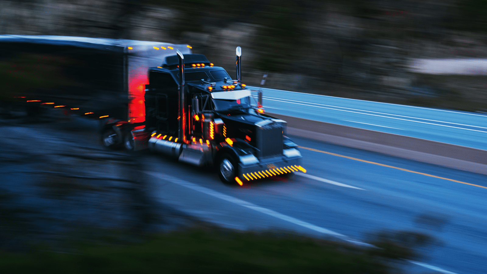 Image of a truck in a highway speeding showcasing How to Navigate Truck Accident Settlements in 2024