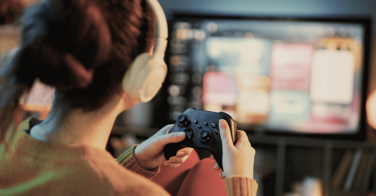 A young teenager staring intensely at a glowing monitor in a dark room, with a digital "overlay" of a slot machine and dopamine molecule, representing the science of gaming addiction.