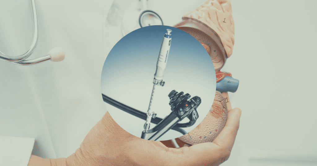 Microscopic view of an Olympus duodenoscope tip under 10X magnification showing contamination and design defects linked to 2025-2026 recalls.