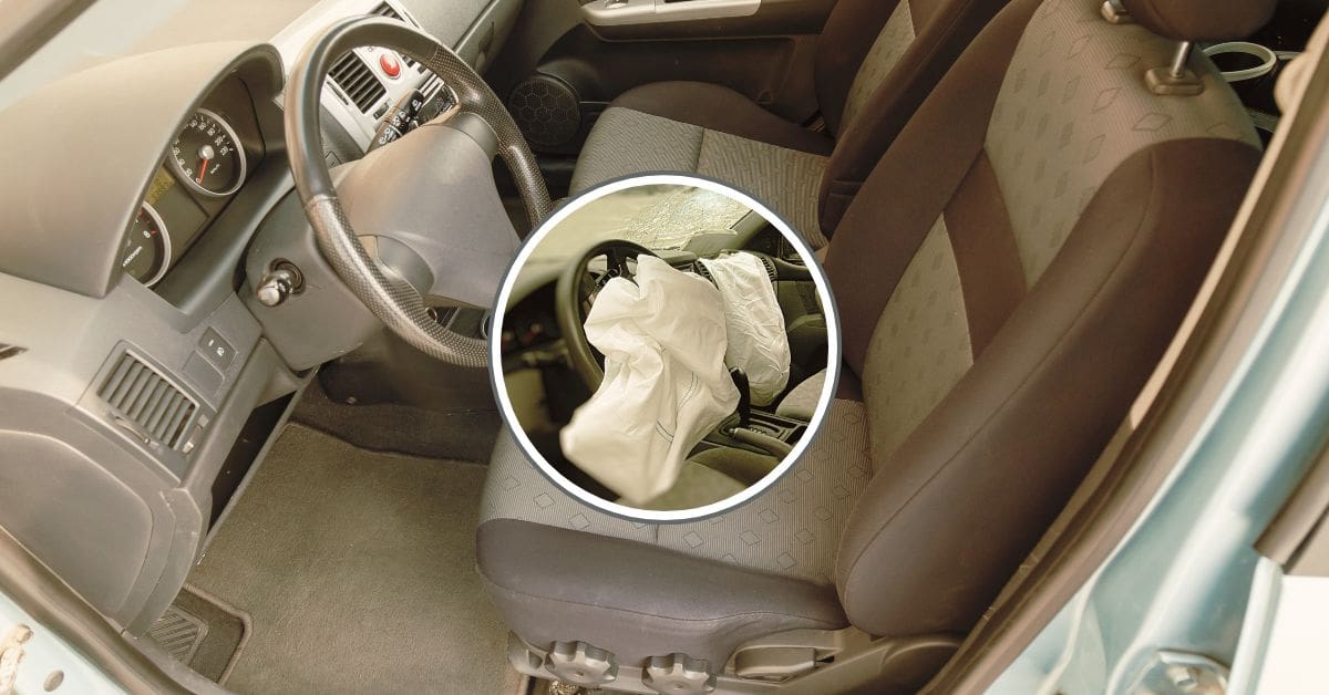 A deployed steering wheel airbag after a car accident, highlighting potential mechanical failures and late deployment risks.