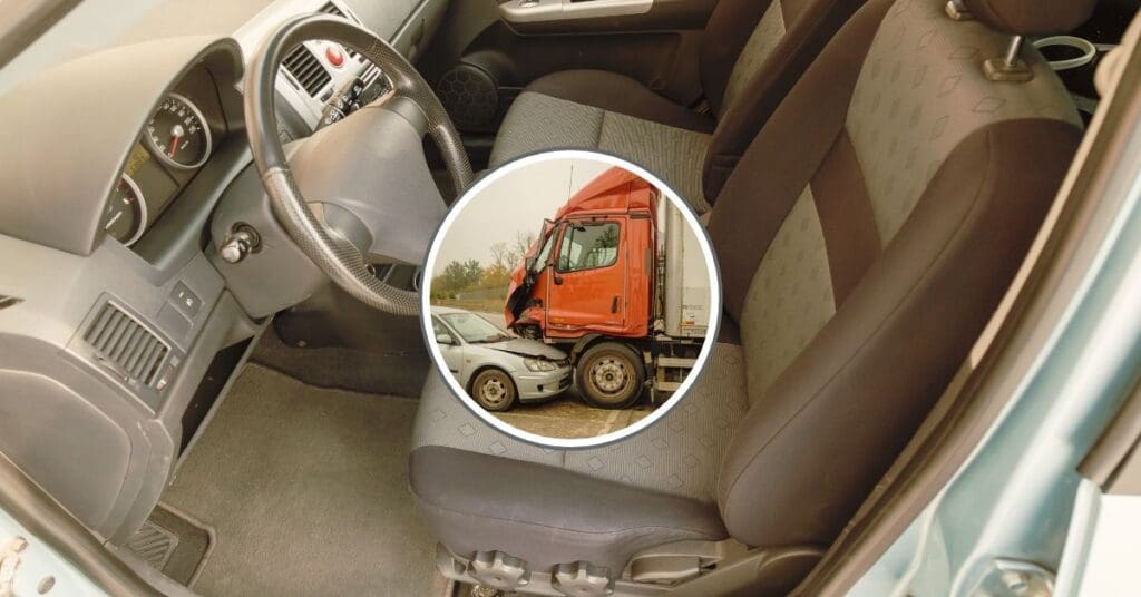 A close-up of a semi-truck's front bumper showing the radar sensor for a Collision Mitigation System (CMS).