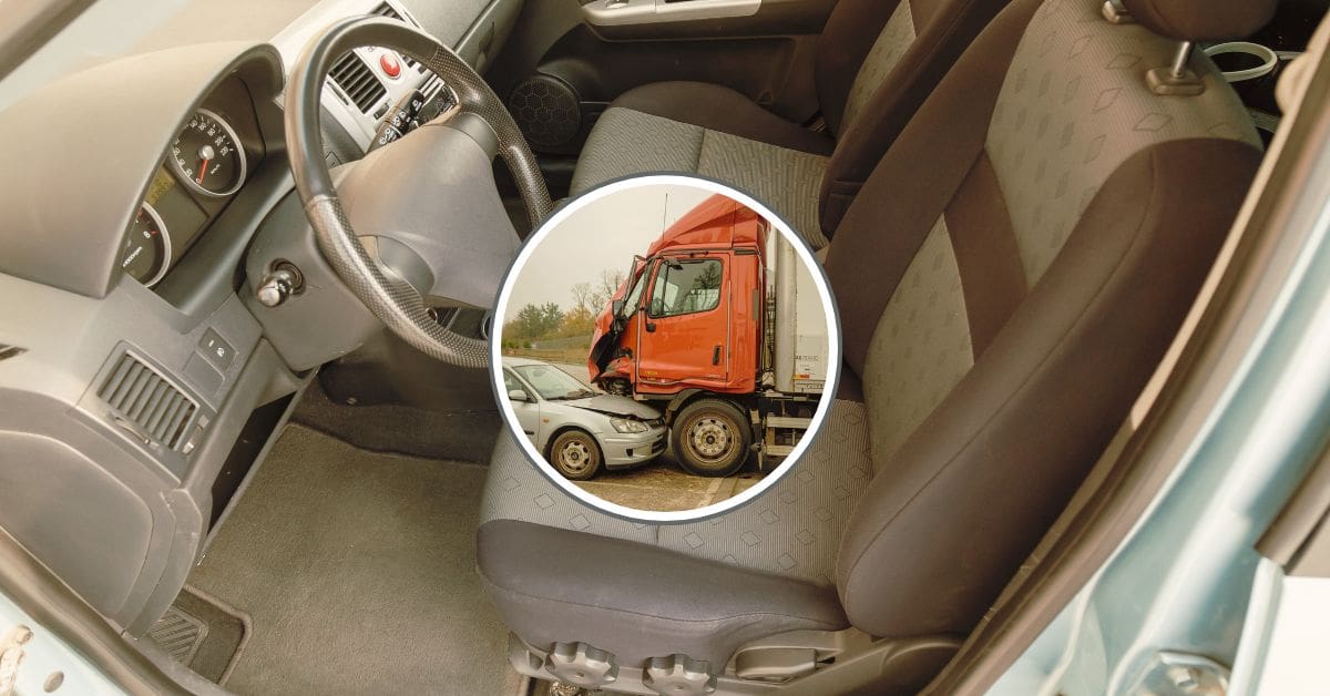 A close-up of a semi-truck's front bumper showing the radar sensor for a Collision Mitigation System (CMS).